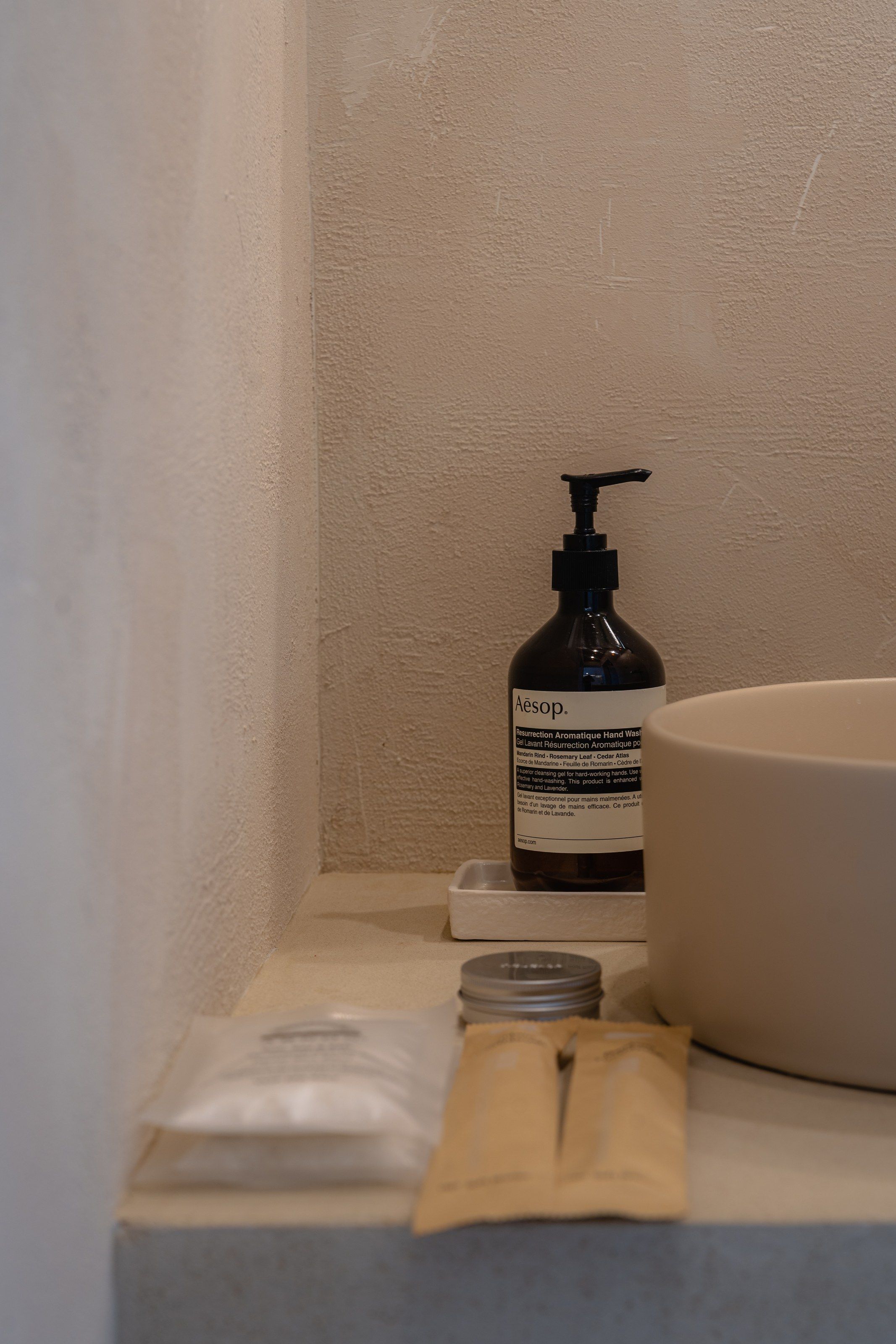 AESOP amenities beside the basin