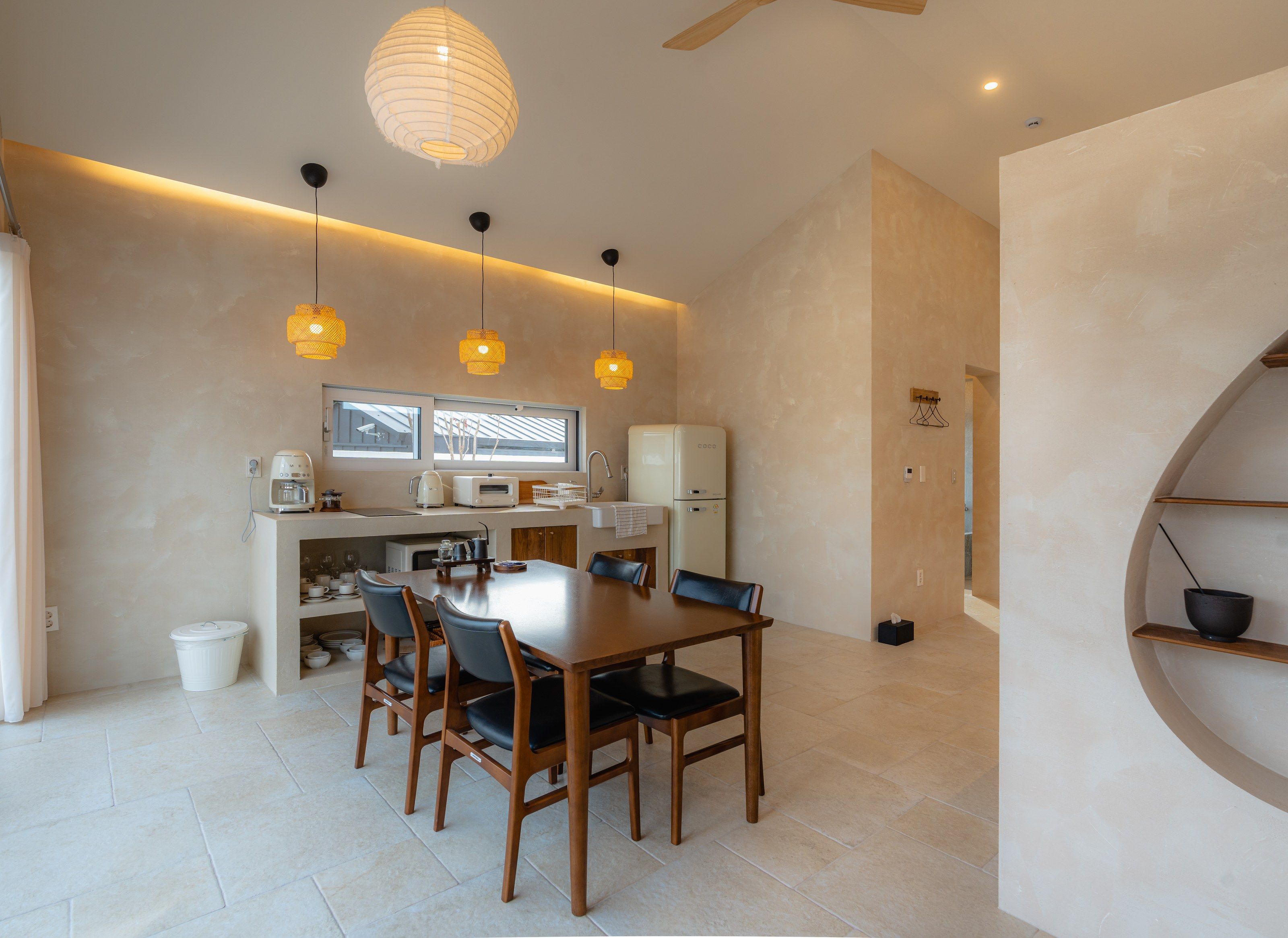 Dining area under pendant lights