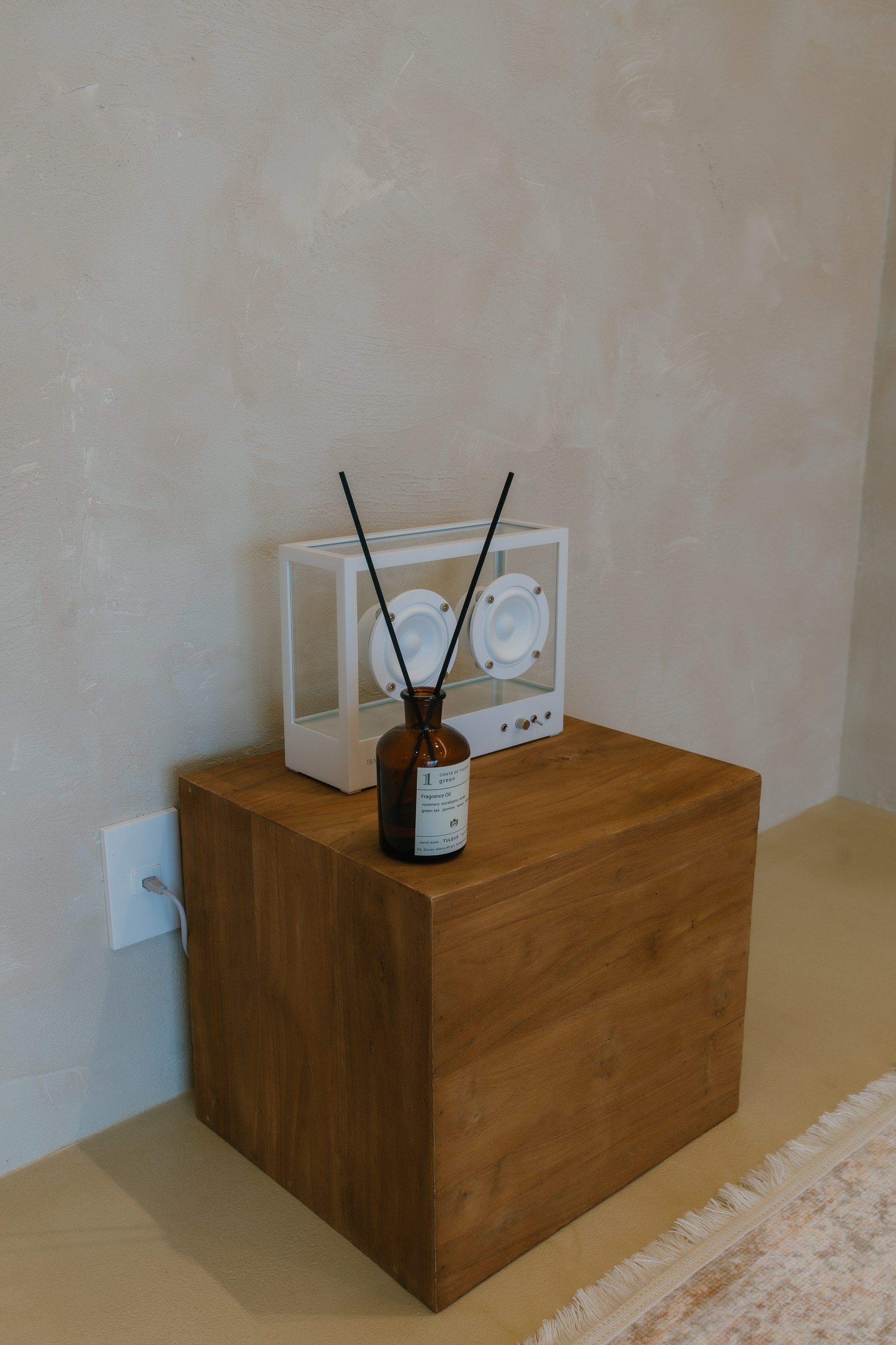 Diffuser on a wooden side table