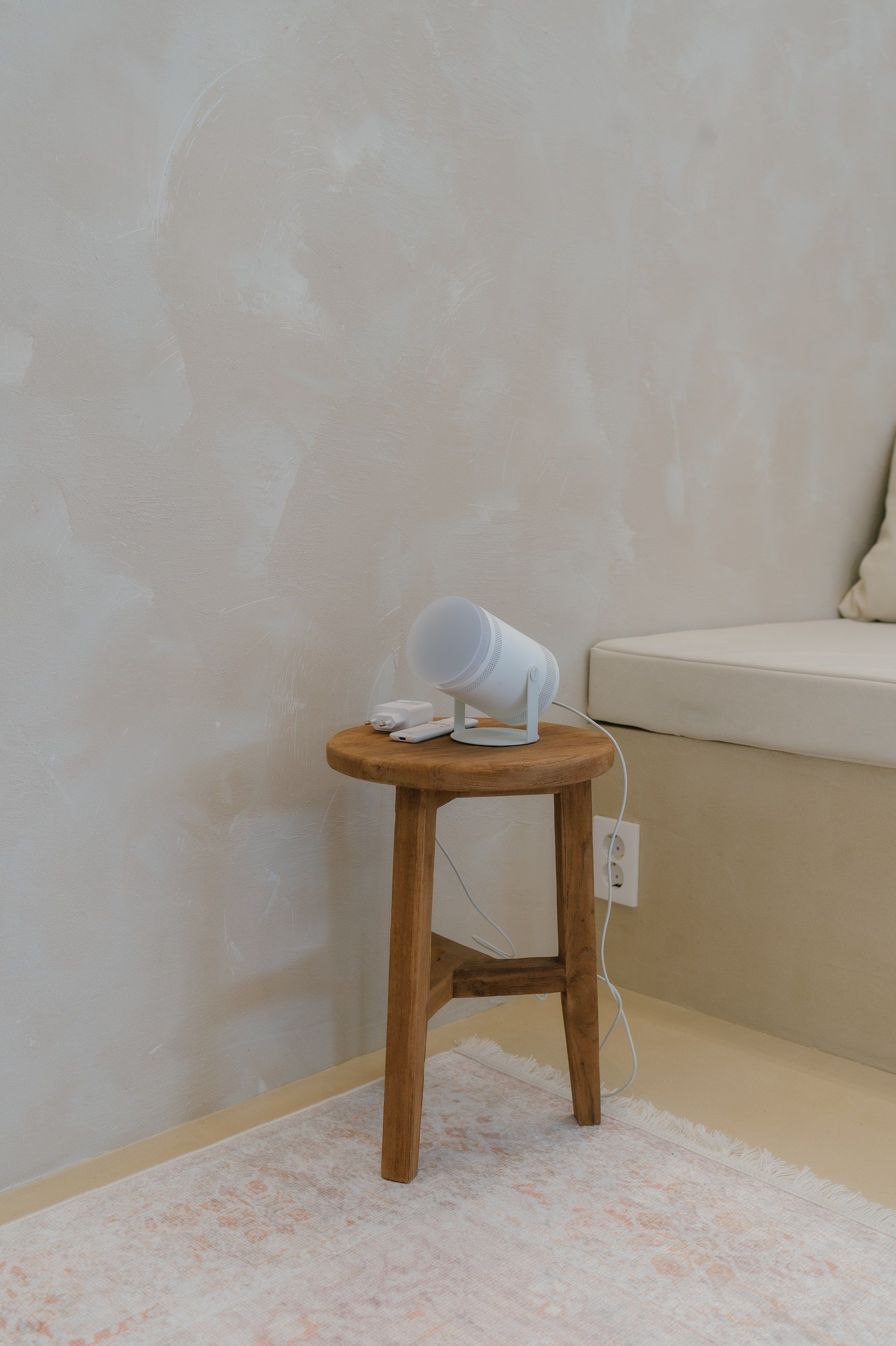 Lamp on a wooden stool